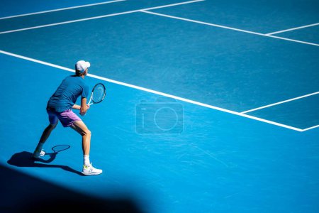 Photo for Professional athlete Tennis player playing on a court in a tennis tournament in summer in america - Royalty Free Image