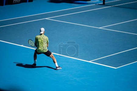 Photo for Professional athlete Tennis player playing on a court in a tennis tournament in summer in america - Royalty Free Image