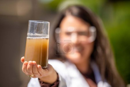 Photo for Soil test, female agricultural scientist conducting a soil test in a scientific lab in. soil agricultural agronomist in australia, soil microbial test in a scientific lab. - Royalty Free Image