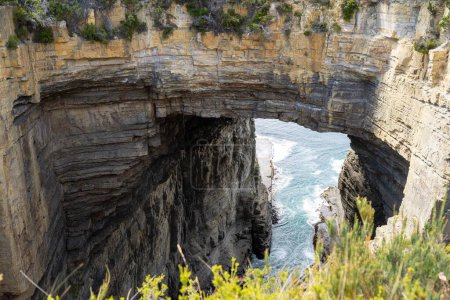 rock bridge on the coastline in australia