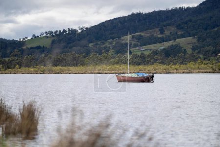 Photo for Yacht anchored in a bay in the australian wilderness in australia - Royalty Free Image
