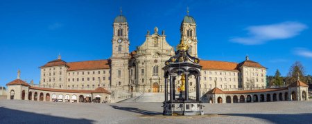 Photo for Einsiedeln, Switzerland - October 27, 2022: The Benedictine Abbey of Einsiedeln with its mighty basilica is the main catholic pilgrimage center in Switzerland - Royalty Free Image