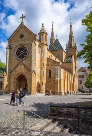 Photo for Neuchatel, Switzerland - August 7, 2023: The collegiate church in Neuchatel, built between 1185 and 1276, represents the Romanesque and Gothic styles. - Royalty Free Image
