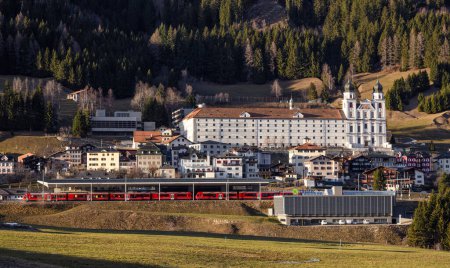 Photo for Disentis, Switzerland - February 2, 2023: Benedictine abbey in Disentis Muster, an alpine town in the Surselva region of the canton of Graubunden in Switzerland. - Royalty Free Image