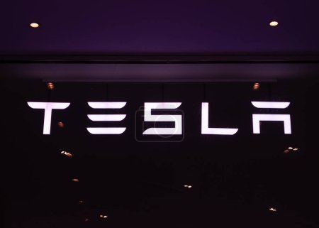 Photo for Geneva, Switzerland - February 3, 2024: Tesla is an American multinational automotive and clean energy company - Royalty Free Image