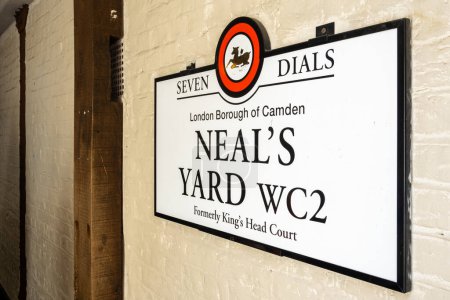 Photo for London, United Kingdom - April 29, 2024: Signboard of Neal's Yard, a colorful and vibrant pedestrian-only alley in the Covent Garden area of London - Royalty Free Image