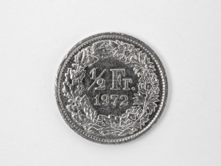 Close-up of a swiss one half franc coin, white background, front side