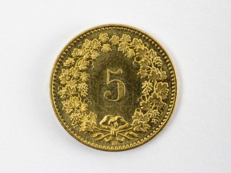 Close-up of a swiss 5 centimes coin, white background