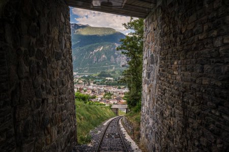 Photo for Tunnels and railways. Light on the end of the tunnel. Crans Montana, Valais Canton, Switzerland. - Royalty Free Image