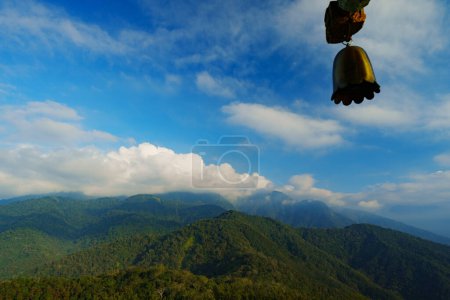 Photo for The wind chime with the background of continous mountains - Royalty Free Image