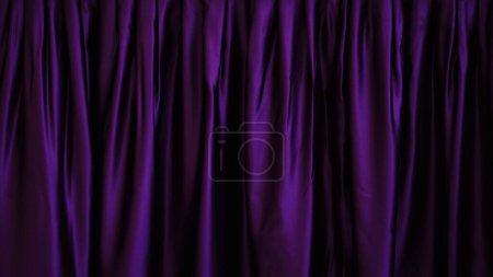 purple waving fabric as a background