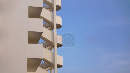 Photo for Fire escapes on building facade against the sky - Royalty Free Image