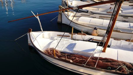 Photo for Rustic wooden fishing boats in mediterranean port - Royalty Free Image