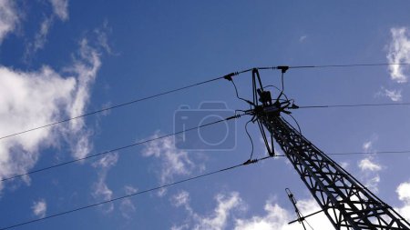 Photo for Medium voltage electric tower against the sky - Royalty Free Image