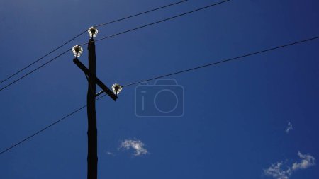Photo for Wooden pole with electric cables against the sky - Royalty Free Image