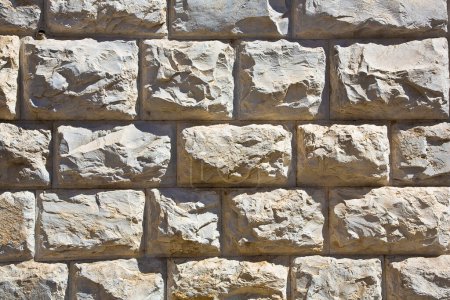 Photo for Old white marble stone wall made with different blocks of rectangular shape in italian language called bugnato (Italy-Tuscany) - Royalty Free Image