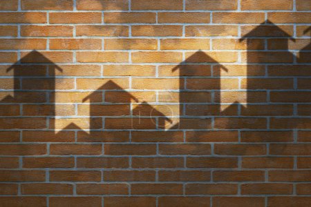 Photo for Building activity, construction industry and housing development concept with imaginary cityscape and shadows against a brick wall - Real estate market or Homeowner Association concept - Royalty Free Image