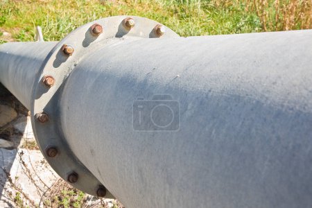 Photo for Plumbing with large metal pipes of a new hydraulic system of drinking water - Royalty Free Image