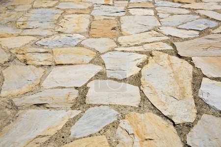 Photo for Old italian paving built with irregularly shaped stone blocks called opus incertum - Royalty Free Image