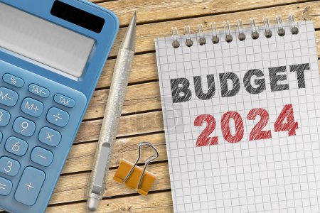 Presupuesto 2024 concepto con bloc de notas, calculadora y pluma sobre la mesa