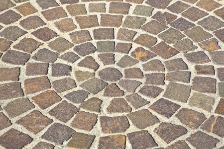 Photo for New paving made with porphyry stone blocks of cubic shape in a pedestrian zon - Royalty Free Image