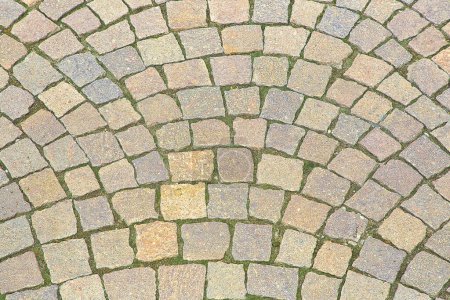 Photo for New paving made with porphyry stone blocks of cubic shape in a pedestrian zone - Royalty Free Image