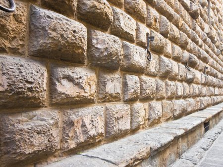 Photo for Detail of the Medici Riccardi's Palace stone wall in Florence: a magnificent example of Renaissance architecture (Italy-Tuscany-Florence) - Royalty Free Image