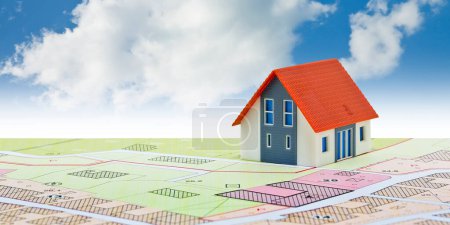 New home and free vacant land for building activity - Construction industry concept with a residential building, imaginary cadastral map, General Urban Planning and zoning regulations  