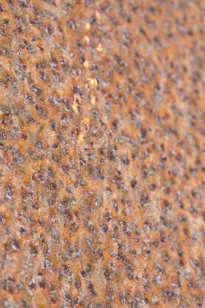 Rusty metal plate used in construction industry - Corten steel background concept with shallow depth of field