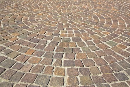 New paving made with porphyry stone blocks of cubic shape in a pedestrian zon