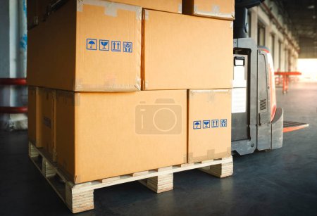 Packaging Boxes Stacked on Wooden Pallet in Warehouse. Cartons, Cardboard Boxes. Shipment Goods. Shipping Cargo Supplies Warehouse Logistics. Poster 621112874