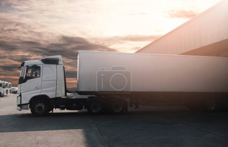 Photo for Semi Trailer Trucks Parked Loading at Dock Warehouse. Shipping Cargo Container Delivery Trucks. Distribution Warehouse. Freight Trucks Cargo Transport. Warehouse Logistics. - Royalty Free Image