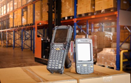 Photo for Barcode Scanner on Packaging Boxes in the Warehouse. Computer Mobile Tools for Inventory Management in Storehouse. Shipping Cargo Warehouse Logistics. - Royalty Free Image
