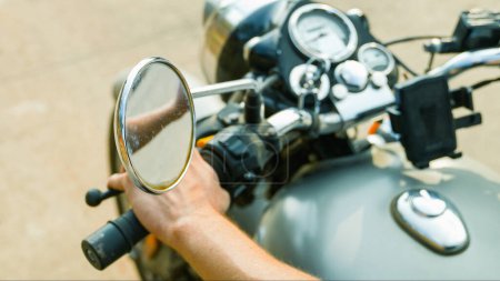 Photo for Male hand on a motorcycle handlebar close up. High quality photo - Royalty Free Image