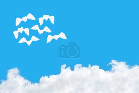 it is group of flying heart shaped clouds fly over white cloud.