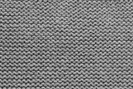 Foto de Es textura de lana de punto gris para el patrón y el fondo. - Imagen libre de derechos