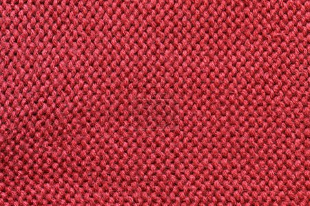 Foto de Es de color rojo oscuro tejido textura de lana para el patrón y el fondo. - Imagen libre de derechos