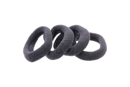 it is four black circle hair bands isolated on white.