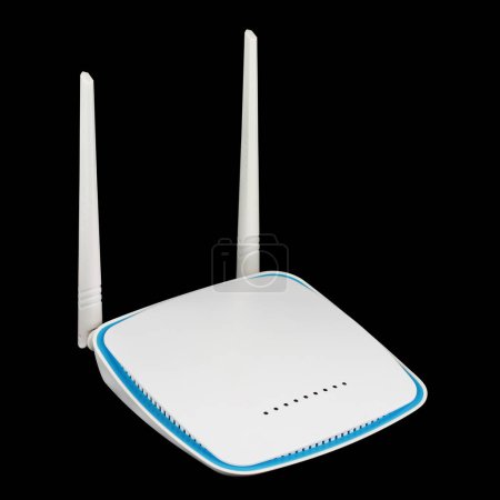 It is Plastic white wireless router isolated on black.