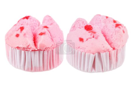 It is Two pink cupcakes isolated on white.