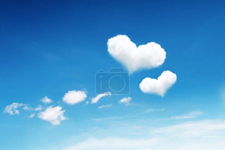 it is two heart clouds on blue sky.