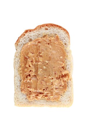 Es ist Erdnussbutter auf Brot, isoliert auf Weiß.