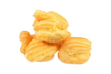 pile of eclair or profiterole isolated on white.