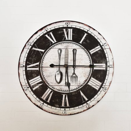 it is vintage wooden clock on white brick wall.