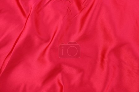 Téléchargez les photos : Il est élégant courbé texture de soie rouge pour le fond et le design. - en image libre de droit