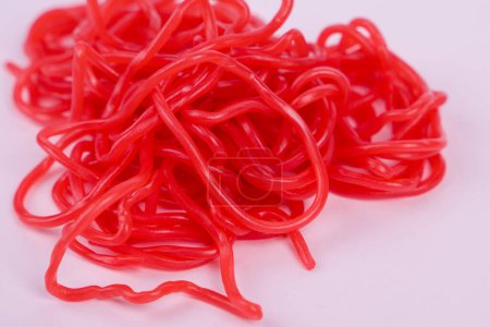 Red jelly candy strings. Selective focus.