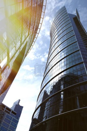 Photo for Modern architecture in the financial area, reflections and blue sky in Warsaw, Poland - Royalty Free Image