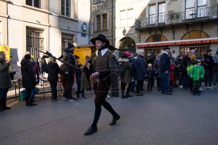 Photo for Geneva, Switzerland - December 11, 2022. The festivities of L' Escalade top annual festival in Geneva take place in December, with parades, demonstrations, music, cannon fires, chocolate and wine - Royalty Free Image