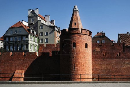 The medieval city wall and barbican fortification, the most visited attraction in the Old Town of Warsaw, Poland.