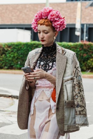 Photo for Judith Bradl wears Antonio Marras jacket and dress, outside Antonio Marras show during Milan Fashion Week Womenswear Spring/Summer 2024. - Royalty Free Image